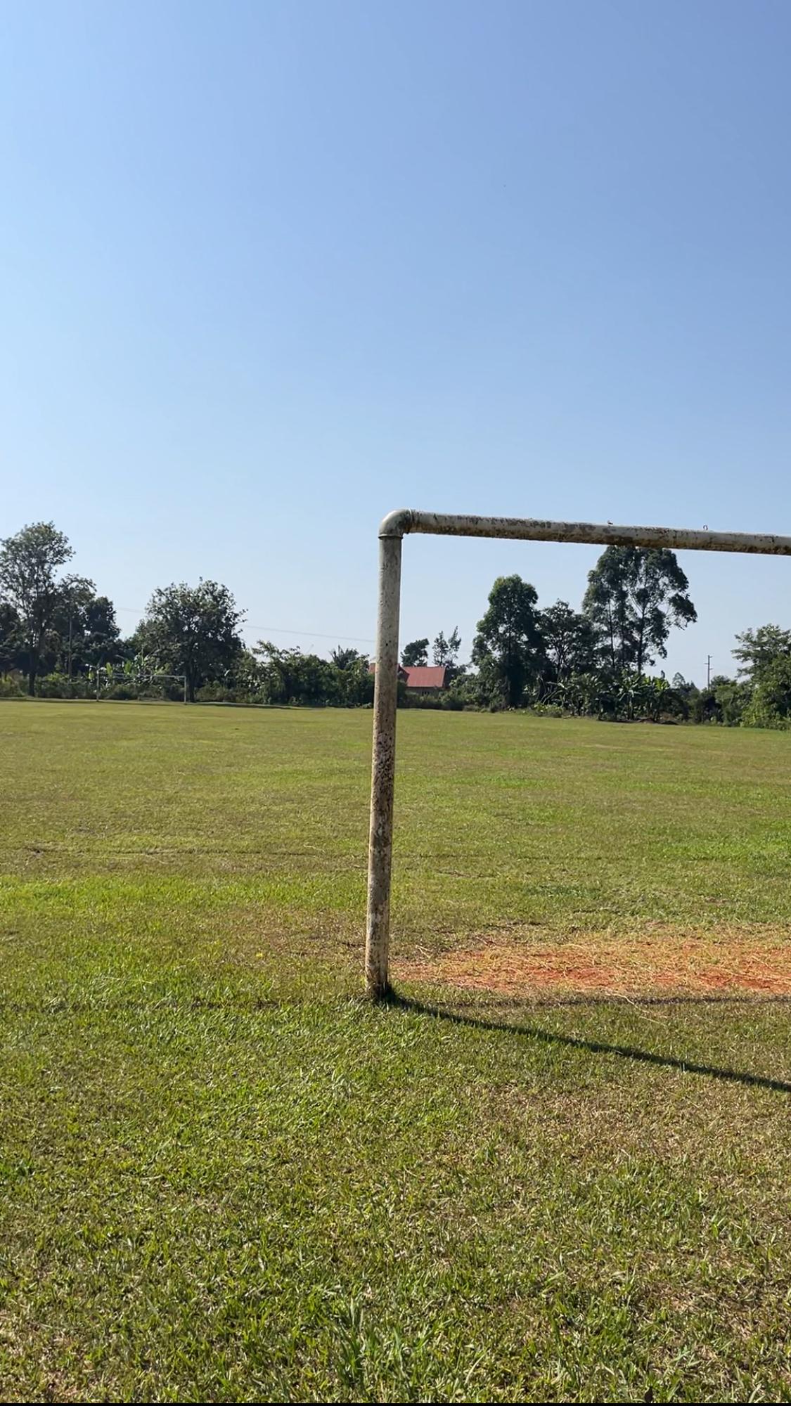 Students playing on a sports field